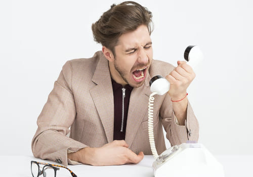 Before Choosing SC: An angry man on the phone, yelling at HOA board members.