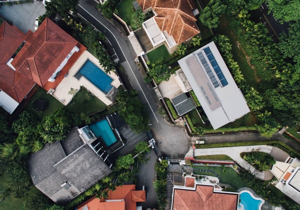 After Choosing SC: Luxurious neighborhood with inground pool and increased real property value.