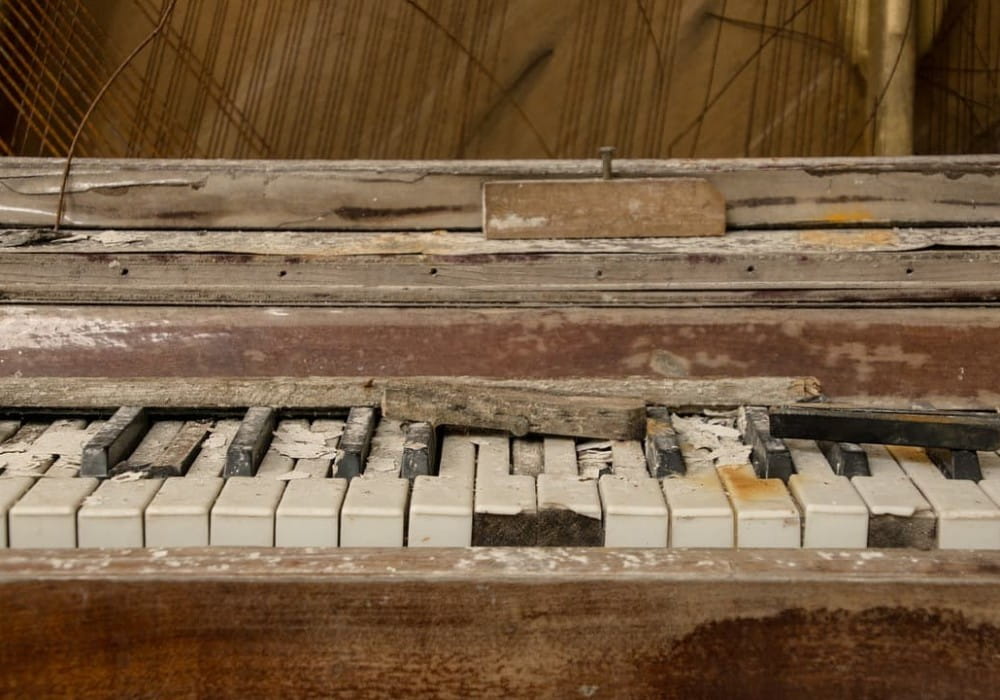 Before Choosing SC: A broken piano representing a broken community.