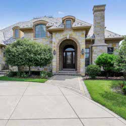 A luxurious white stone house under authority of Harrison West POA